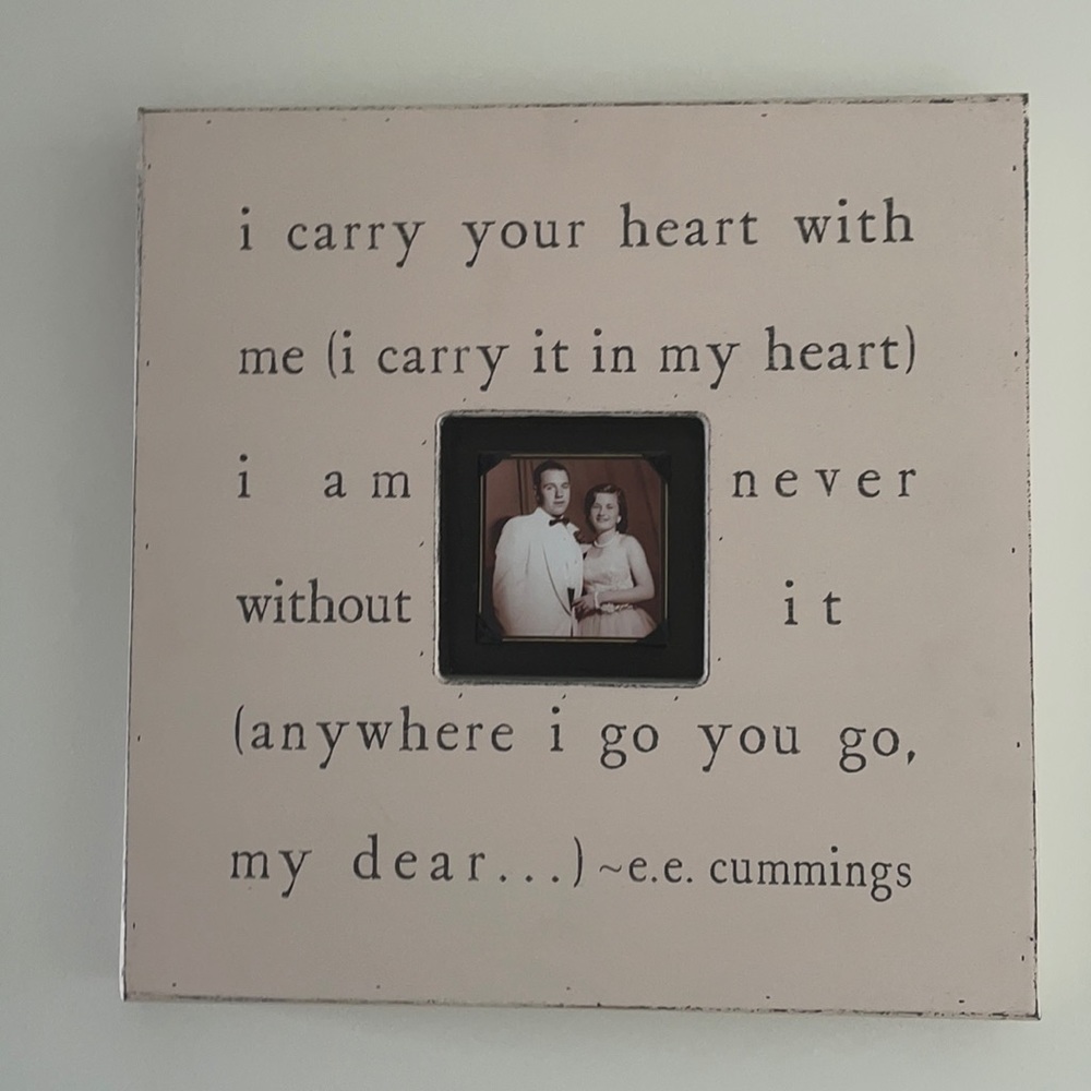 handmade and painted on real wood. Fits a 4” photo